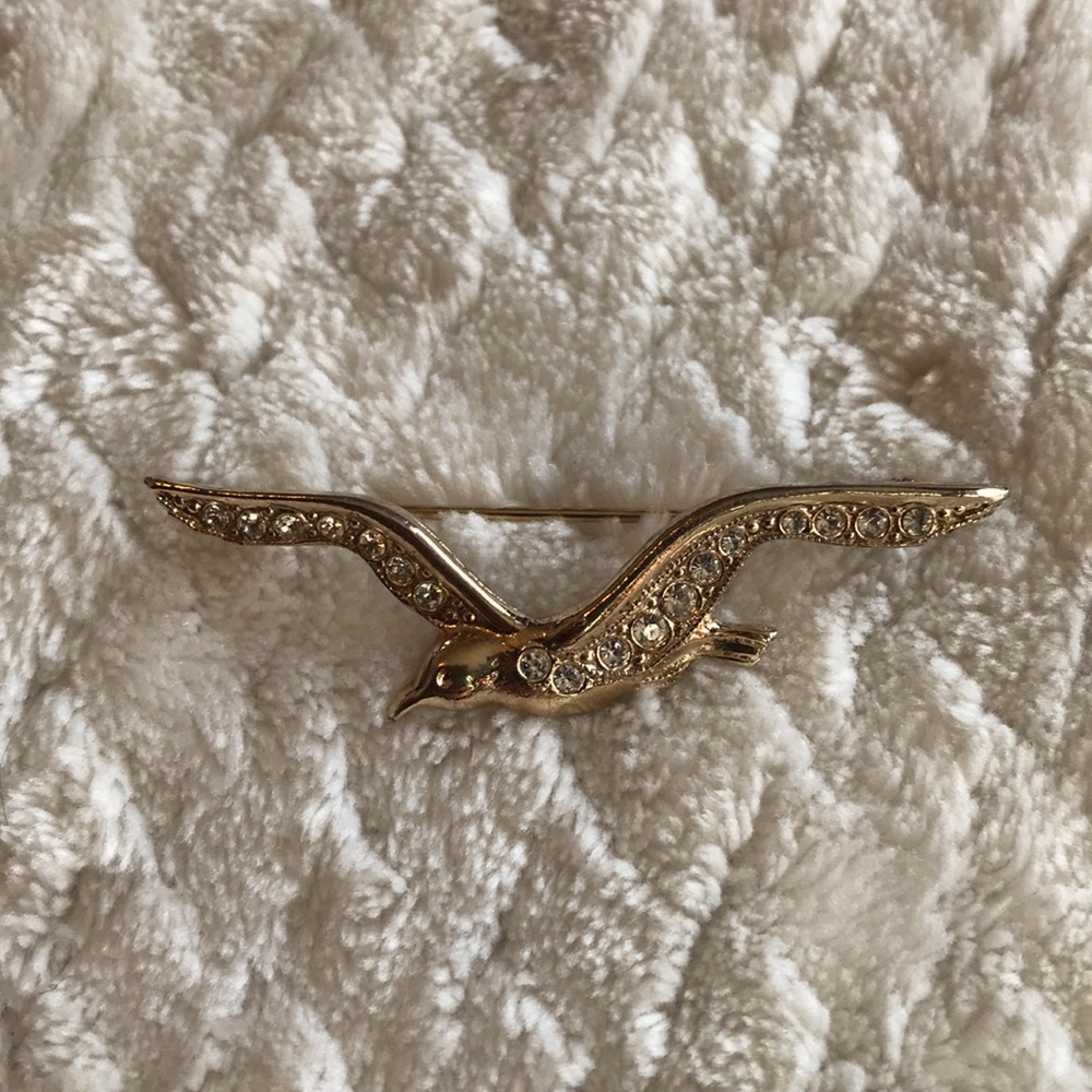 Flying bird gold-tone rhinestone pin